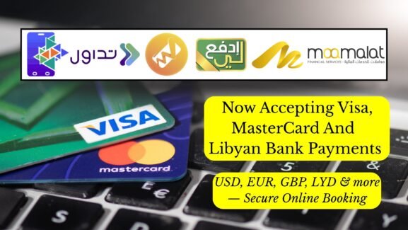 Visa, MasterCard, and Libyan payment logos displayed above a laptop keyboard to illustrate secure online payments on Booking-Libya.com